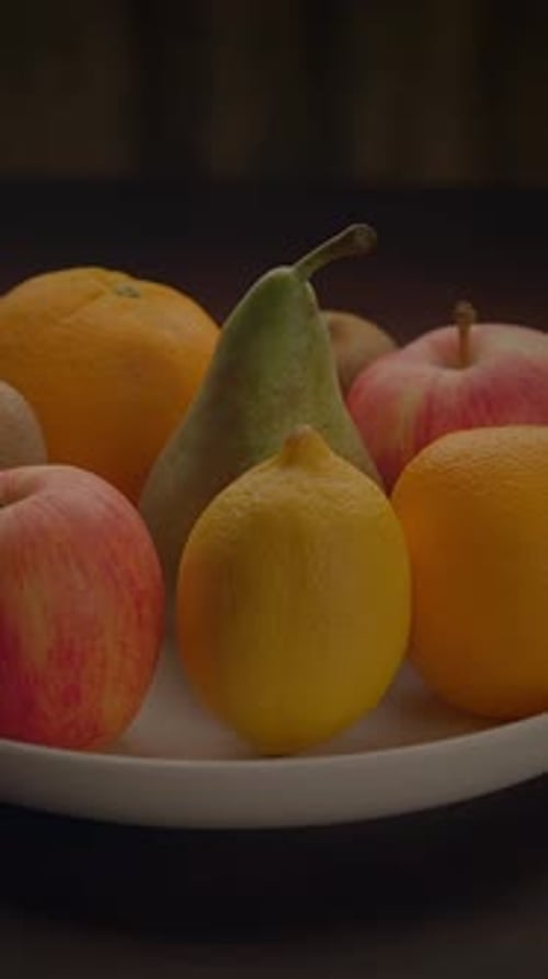Colorful Assortment of Tasty Fresh Fruit on Plate