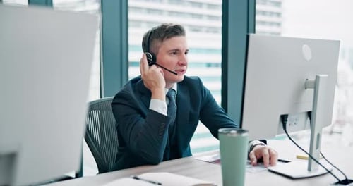 Businessman, agent or call center with headphones for telemarketing or customer service at office
