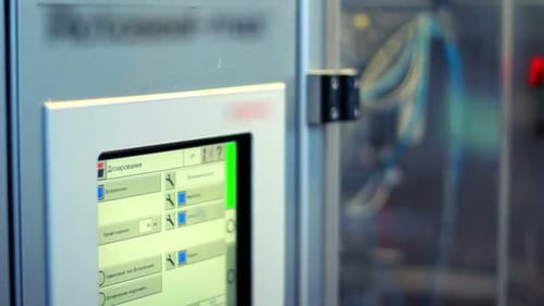 Industrial Control Panel Display Closeup/Modern Industrial Equipment/Worker Operates Computer Con...