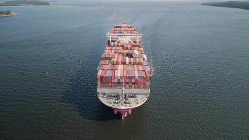 Drone Shot of a Container Ship Entering a Port in the Atlantic Ocean
