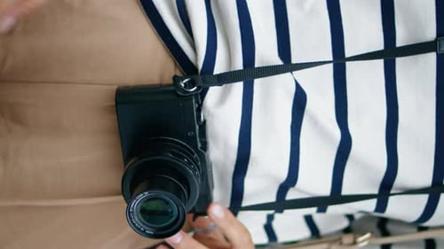 Woman Taking Photo with Digital Camera