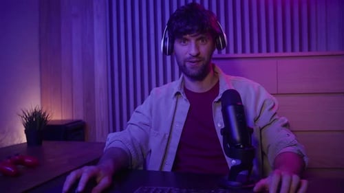 Young Man Gaming and Live Streaming at Home