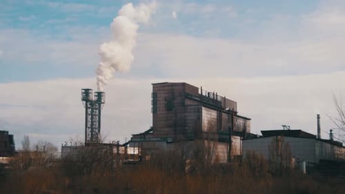 Smoke From Pipes of the Industrial Plant in the City