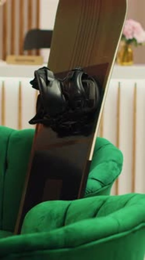 Vertical Video Skiing Equipment and Attire in Lobby