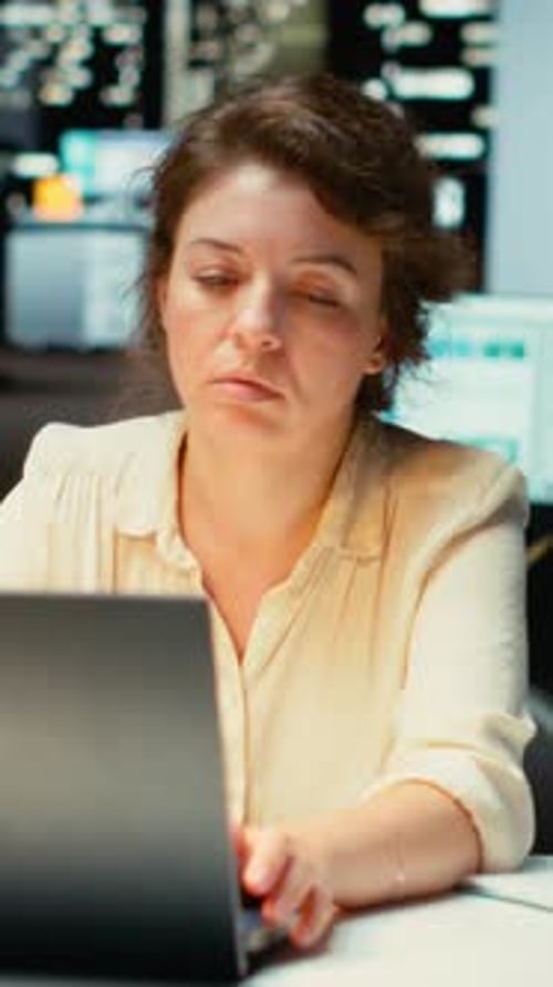 Vertical Video Executive Manager Sighing Feeling Tensed and Overwhelmed After Hours