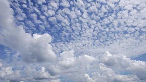 Clouds Moving Rapidly in Blue Sky During the Day