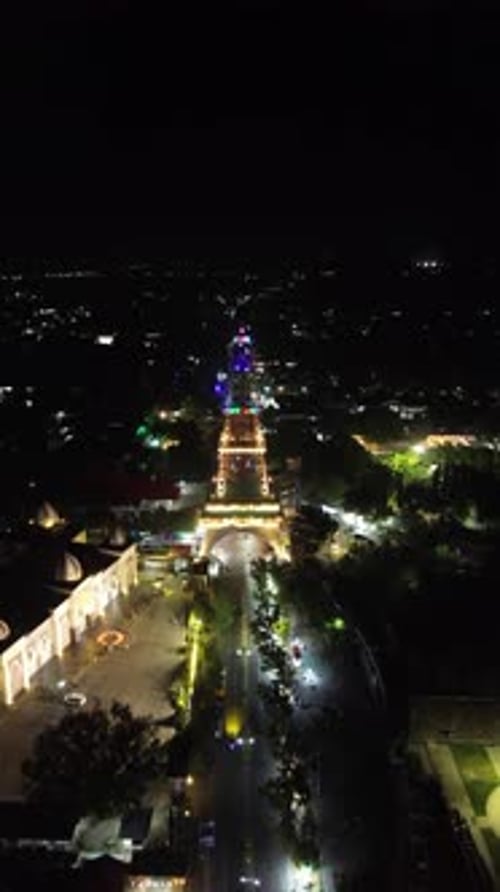 Vertical drone footage of Limboto Majesty Tower or Pakaya Tower at night