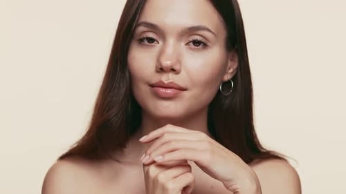 Beautiful Young Woman Posing in Studio Setting