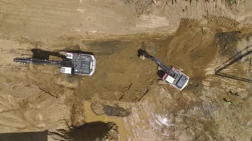 Aerial View Beginning Construction First Concrete Pour and Heavy Machinery at Work