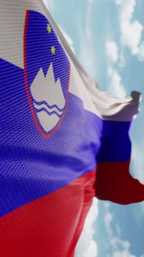 Realistic Slovenian Flag Waving in Blue Sky