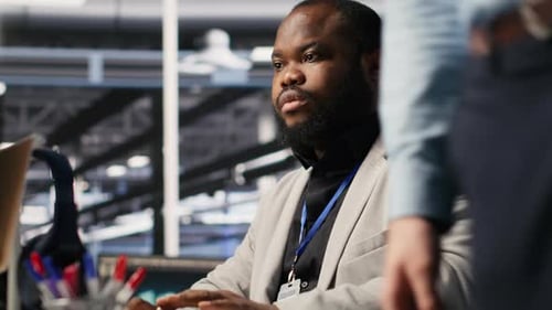 Data Center Computer Scientist Monitoring Servers Performing AI Training