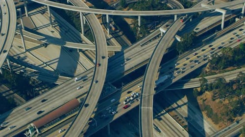 Los Angeles California 110 highway traffic flowing smoothly on a sunny day