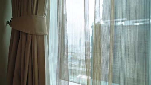 Sheer Curtains with City View in Daytime