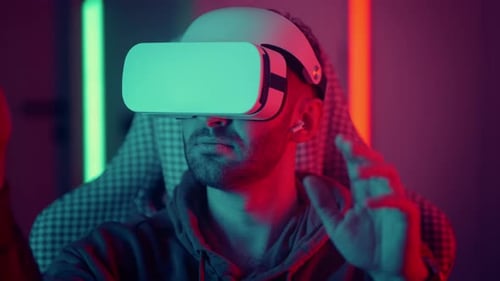 Young Adult Immersed in Virtual Reality Gaming