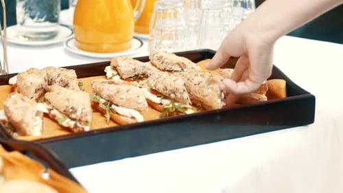Delicious sandwich grabbed of a tray from the catering