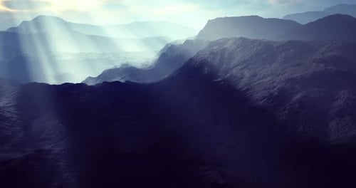 Mysterious Mountain Landscape Under Soft Sunlight at Dawn Hour