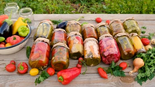 Preservation of Vegetables in Jars Woman Selective Focus