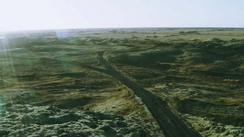 Aerial : Beautiful deserted crossed roads, separate paths in sunrays. Paths crossing.