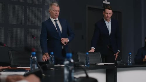 Confident businessmen discuss international economy at government summit meeting