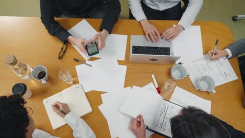 Top View of Company Reporting Meeting Accountants Financial Analysts Business Workers Team Gathered