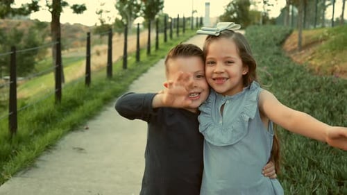 children siblings friends cousins happy enjoying their friendship playing laughing in the park