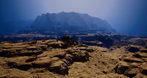 Majestic Rocky Landscape Under a Breathtaking Blue Sky at Dusk