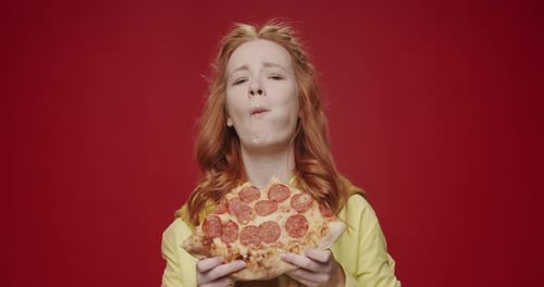 Hungry Woman Enjoying Pizza