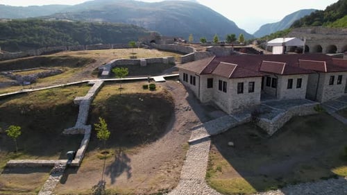 Beautiful architecture of medieval buildings with stone walls and alleys inside castle of Prizren