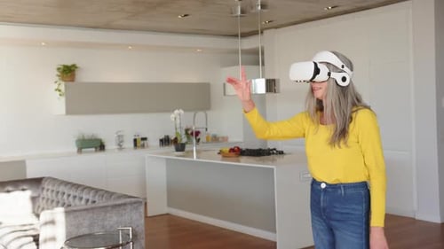 Woman Uses Virtual Reality Headset in Modern Home
