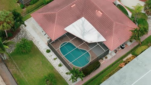Aerial Above View of Screened in Pool and Lanai in Florida Houses