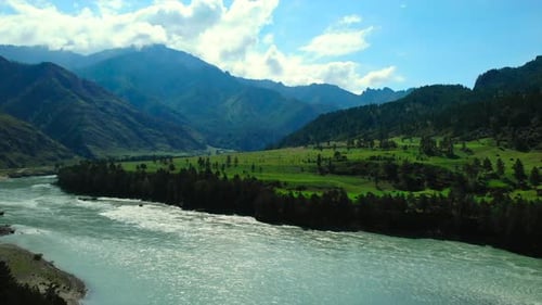 Mountain River Flowing Through Green Valley Landscape Media