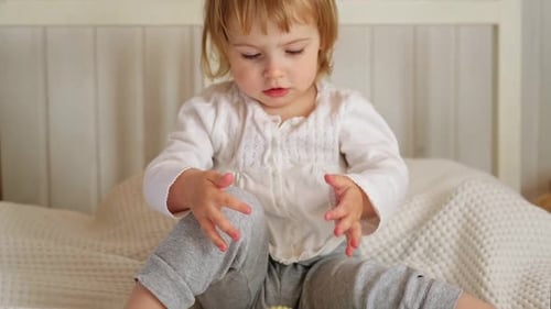 Happy Child Playing With Colorful Sensory Toys