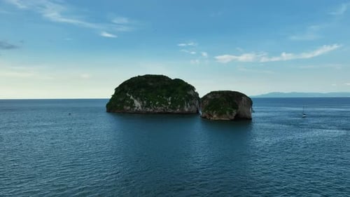 Aerial view approaching the Mismaloya arches, evening in Puerto Vallarta, Mexico
