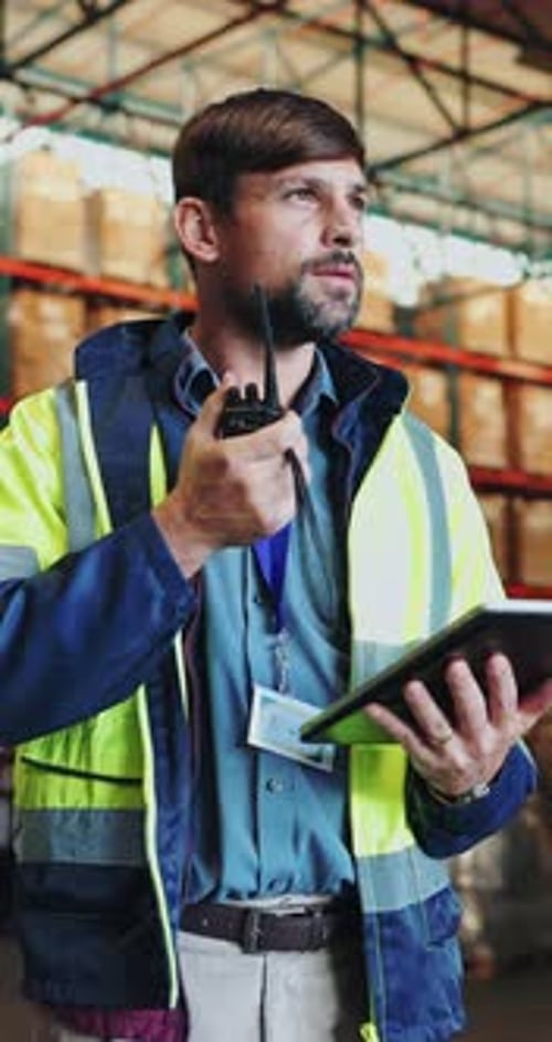 Radio, man and shipping with tablet in warehouse for communication, delivery or inspection