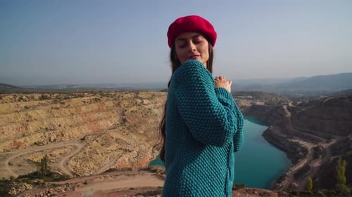 Woman in Red Beret Poses by Quarry Lake