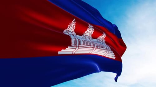 Realistic Waving Flag of Cambodia against Blue Sky