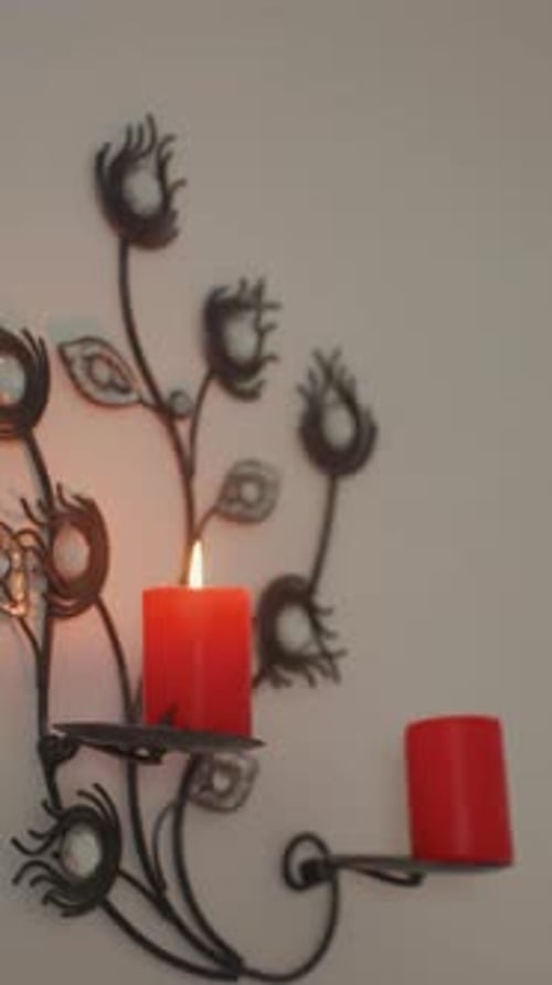 Soft Lighting Enhances Soothing Therapy Environment Elegant Red Candle with Decorative Holder