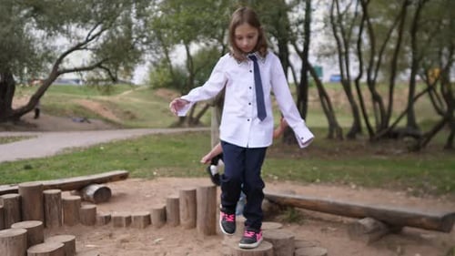 Group of Little Girls Children Playing Together Happily in a Summer Park