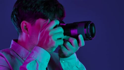 Backstage Photographer in Studio Shooting with Camera