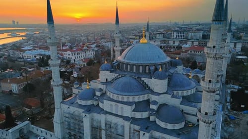Aerial drone view of Istanbul at sunset, Turkey. The Blue Mosque, with gardens and buildings around,