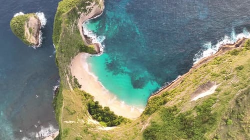 Stunning beachside - Kelingking Beach Nusa Penida - Aerial footage.
