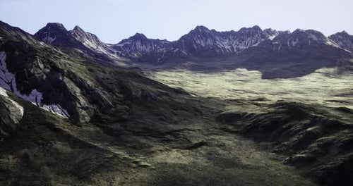 Majestic Mountain Landscape with Rugged Terrain and Clear Blue Sky