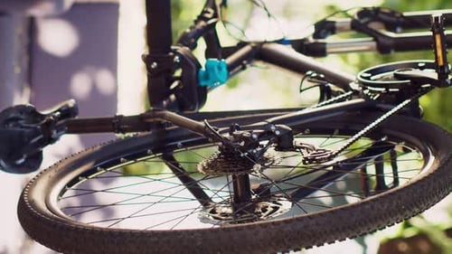 Vertical Video Caucasian Man Repairing Modern Bicycle