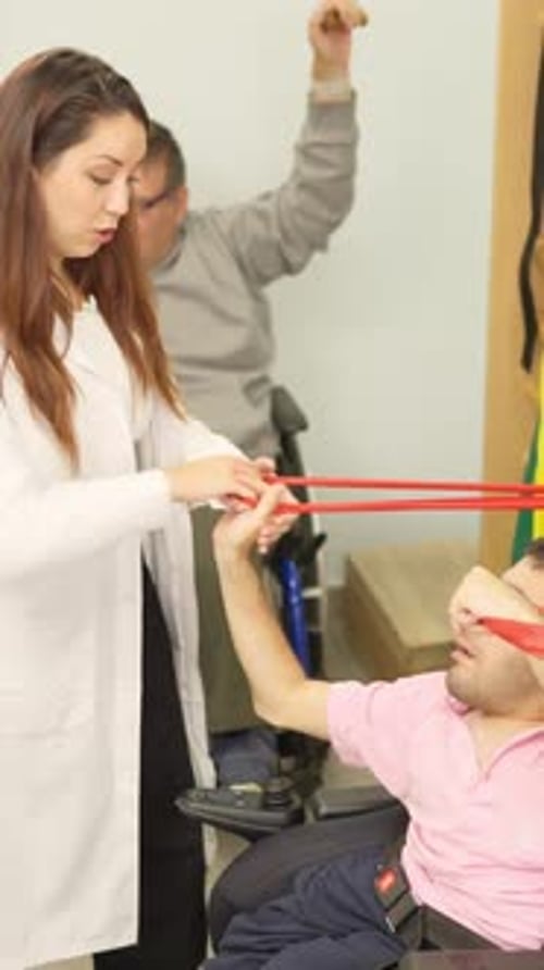 Woman Therapist Working with Patient in Therapy Office