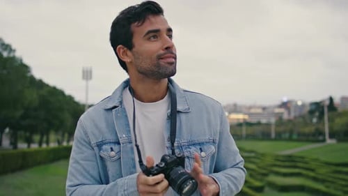 Unshaven Guy Photographing Park Nature at Cloudy Spring Evening Close Up