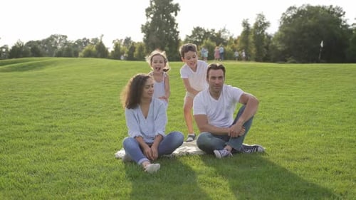 Happy Loving Family Bonding at Summer Park