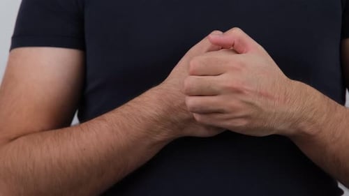 Person intensely scratching their hand