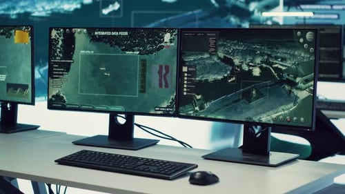 Computer Monitors Displaying Data and Information