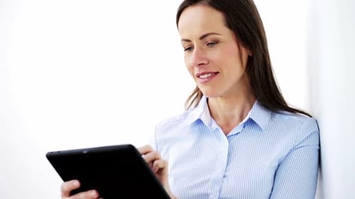 Business, People and Technology Concept - Smiling Businesswoman with Tablet Pc Computer Adult