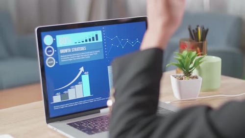 Close Up Of Asian Businesswoman Being Happy After Seeing Statistics, Graphs And Charts On Computer